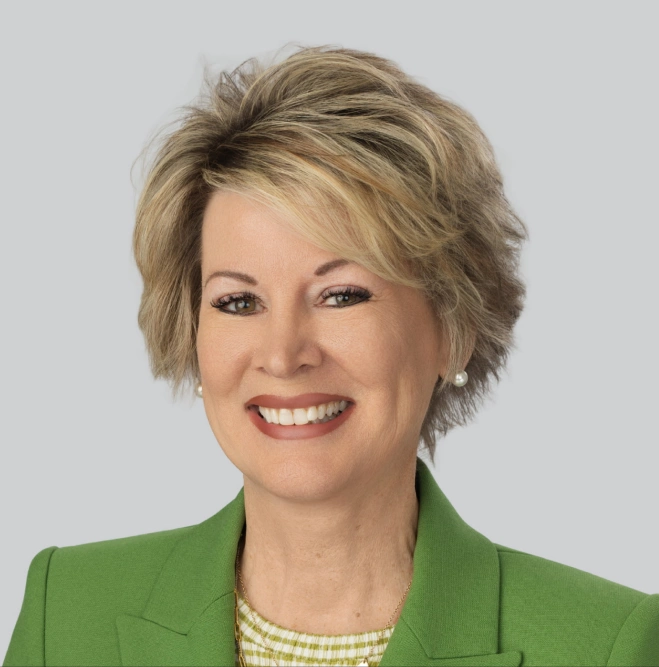 Janet Traphagen, President of Creative Group, featured on the company leadership team page.